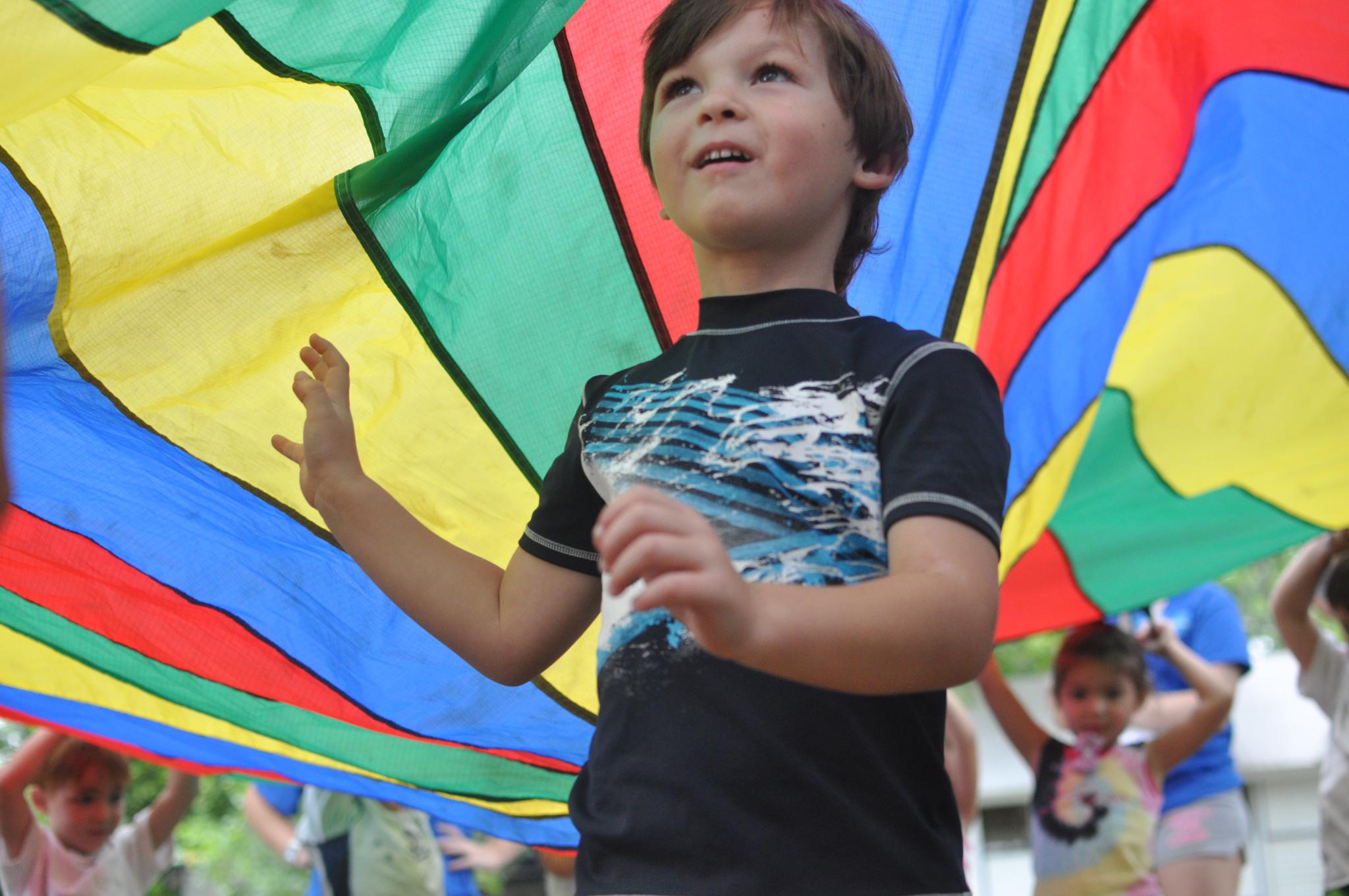 parachute boy very colorful_2048x1360 - LakeView Day Camp